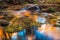 Beautiful shot of the Bear Canyon Lake, scenic autumn nature reflecting on the water surface