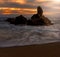 Beautiful shot of a beautiful colorful sunrise on the shore of Cala del Paller in Spain