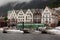 Beautiful shot of boats and the facades of the historical buildings in Bergen, Norway