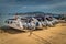 Beautiful shot of a bunch of boats in a sea under the cloudy skies