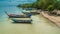 Beautiful shot of a bunch of boats in a sea under the cloudy skies in Ao Chalong, Phuket