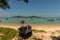 Beautiful shot of a bunch of boats in a sea under the cloudy skies in Rawai Beach, Phuke