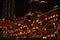 Beautiful shot of Chinese traditional houses illuminated at night against skyscrapers