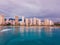 Beautiful shot of the cityscape of Honolulu, Hawaii with an indigo clouds background