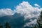 Beautiful shot of clouds on mountains on Parco Naturale Val Troncea, Italy