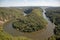 Beautiful shot of a curving river of Saar Loop in Saarland, Germany