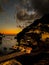 Beautiful shot of a dark sunset sky over the shore of Positano, Amalfi Coast, Italy