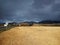 Beautiful shot of drylands in Corralejo Natural Park during a storm in Corralejo, Spain