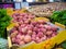 Beautiful shot of fresh lychees and hazelnuts in the boxes for sale