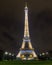 Beautiful shot of the great Eiffel Tower at night in the capital Paris, France