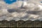 Beautiful shot of greenhouses under a blue cloudy sky