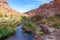 Beautiful shot of a hot spring surrounded by rocks in a desert San Pedro de Atacama, Chile