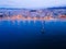 Beautiful shot of a long pier and observation deck on the beach in Badalona at night