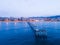 Beautiful shot of a long pier and observation deck on the beach in the evening in Badalona, Spain