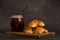 Beautiful shot of medialunas croissants and yerba mate infusion placed on a wooden cutting board