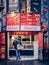 Beautiful shot of a men buying snacks in the street of Nantes in France