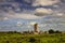 Beautiful shot of Moyne Abbey Ruins in County Mayo, Ireland under the cloudy blue sky