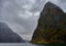 Beautiful shot of Naeroyfjord mountains under a cloudy sky in Norway