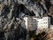 Beautiful shot of the Predjama Castle in the mountains of Postojna, Slovenia