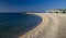 Beautiful shot of a relaxing beach with a space to sit and admire the beauty of the ocean