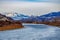 Beautiful shot of a river and the snowy mountains of Yellowstone National Park