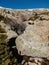 Beautiful shot of the rocks on the ground in Penalara mountain in Spain on a sunny day