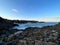 Beautiful shot of rocks on the shore of a lake in Kiama, Australia