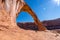 Beautiful shot of rocky formations of arch canyon under blue sky