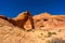 Beautiful shot of rocky formations of arch canyon under blue sky