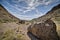 Beautiful shot of a rocky pathway with rocky hills on both sides