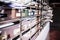 Beautiful shot of rows of shiny silver mailboxes with some envelopes sticking out