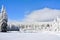 Beautiful shot of a rural territory in a snowy forest landscape