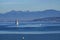 Beautiful shot of sailboats on the Bodensee lake near mountains in switzerland