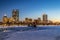 Beautiful shot of a sea with the background of illuminated buildings in Boston, USA