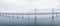 Beautiful shot of a self-anchored suspension bridge over a blue sea