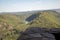 Beautiful shot of a stone lookout over green hills in Saarschleife