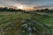 Beautiful shot of a sunset over a field in Barruecos, Extremadura, Spain