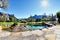 Beautiful shot of a swimming pool in the backyard of a luxury house