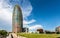 Beautiful shot of Torre Glories skyscraper surrounded by other buildings, Barcelona Spain