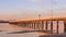 Beautiful shot of wispy clouds adorning the Long Jetty at sunrise, Port Welshpool