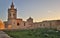 Beautiful Side view on the old, historical St. Joseph`s Chapel inside the Citadel of Victoria surrounded by antique ruins, walls