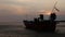 Beautiful silhouette fishing boat and Sunset over the sea. Bangpu Recreation Center (Samut Prakan, Thailand)