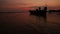 Beautiful silhouette fishing boat and Sunset over the sea. Bangpu Recreation Center (Samut Prakan, Thailand)