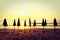 Beautiful Silhouette umbrella on the beach and sea