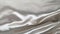 Beautiful silk fabric of white color, draped with small folds, softly flowing, luxury, wedding concept, texture, background, form