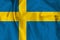 Beautiful silk flag of Sweden with soft folds in the wind