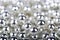 Beautiful silver christmas beads as background