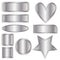 Beautiful silver metal buttons, heart and star over white background