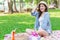Beautiful single women girl teen enjoy relax holiday picnic outdoor at green park alone