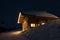 Beautiful skiing hut at night
